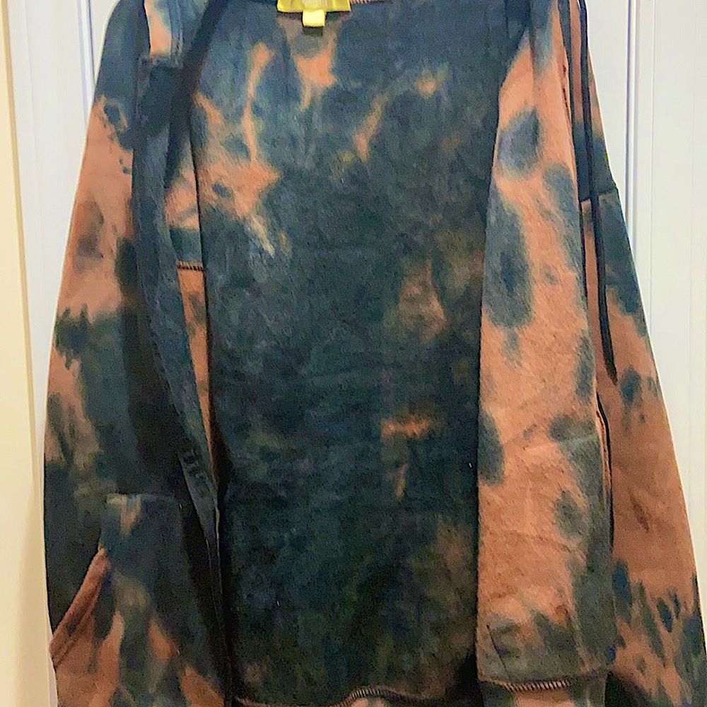 This is a sweater that has butterflies on it and it’s really soft from inside